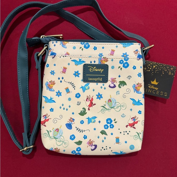 Loungefly Handbags - Loungefly Disney Princess Cinderella characters Cream Crossbody Bag